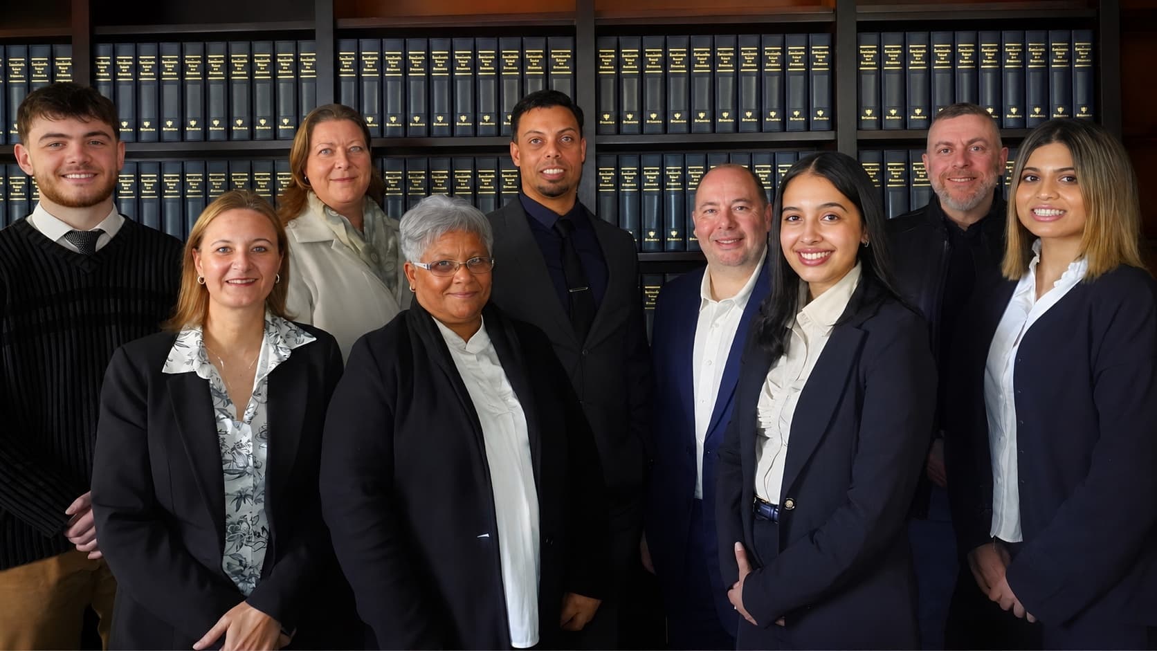 The full MML Attorneys team in the firm library